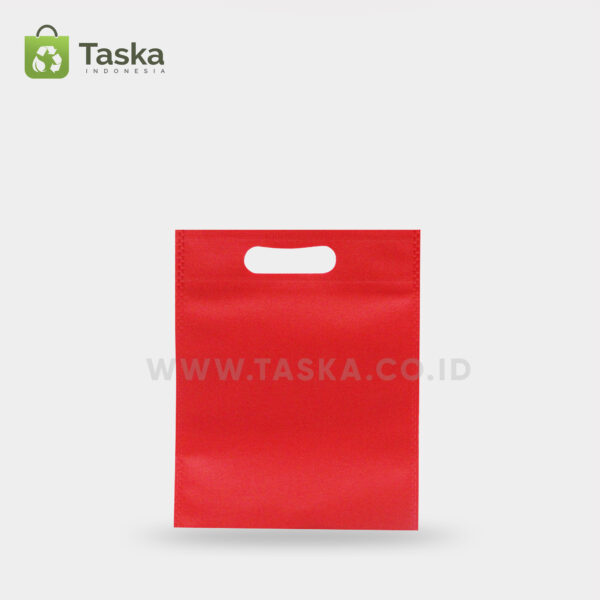 Tas Press Spunbond Oval – Merah 20×25 Cm – Sisi Depan