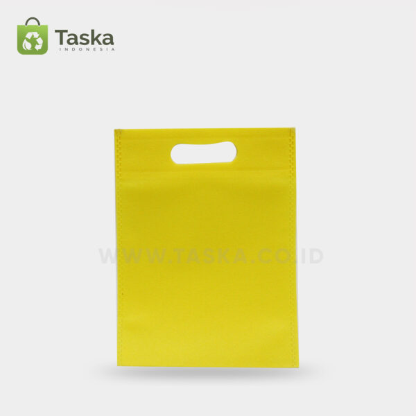Tas-Spunbond-Oval–Kuning-25×35-Cm–Sisi-Depan