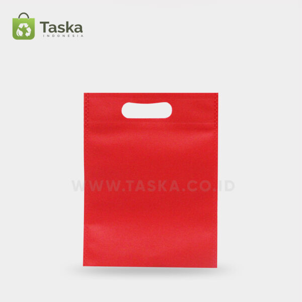 Tas-Spunbond-Oval–Merah-25×35-Cm-Sisi-Depan
