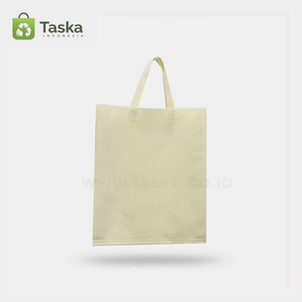 Tas Press Spunbond Handle – Cream 25×35 Cm – Sisi Depan