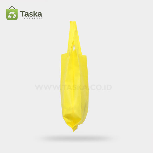 Tas Press Spunbond Handle – Kuning 30×40 Cm – Sisi Kiri