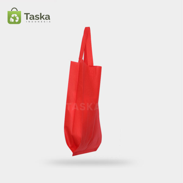 Tas-Press-Spunbond-Handle—-Merah-30×40-Cm—Sisi-Samping-Kanan