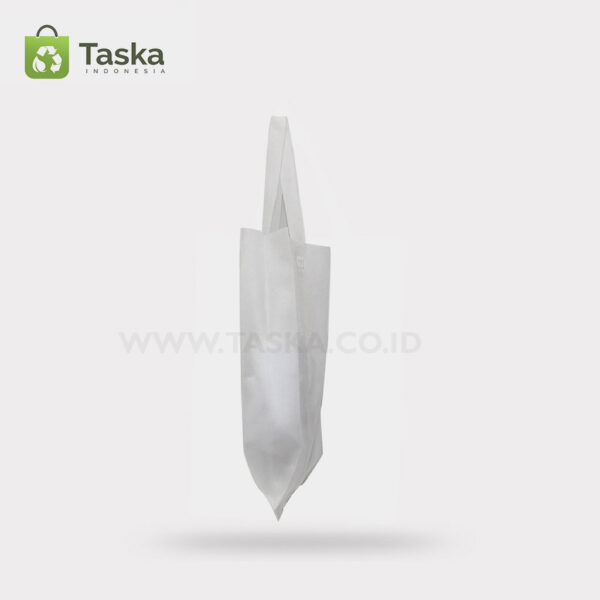 Tas Press Spunbond Handle – Putih 25×35 Cm – Sisi Kanan