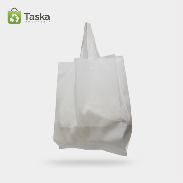 Tas Press Spunbond Handle – Putih 38×45 Cm – Sisi kiri