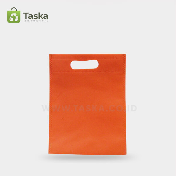 Tas-Spunbond-Oval-Orange25x35-Cm–Sisi-Depan